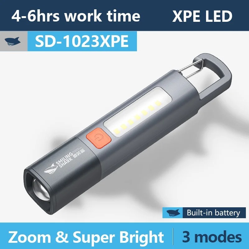 Mosolygó cápa SD1023 LED zseblámpa XPE szuperfényes zseblámpa kampós Camping Light USB újratölthető, nagyítható vízálló