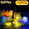 10 db-os szett Pokemon éjszakai fény izzó Pikachu Gengar Charizard Psyduck Squirtle Aranyos Kawaii puha állati ágy melletti lámp