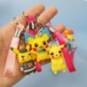 24 db/Szett Véletlenszerű Pokemon kulcstartó Kawaii Pikachu kulcstartó Aranyos akciófigurák gyerekeknek Játékok Ajándék medál